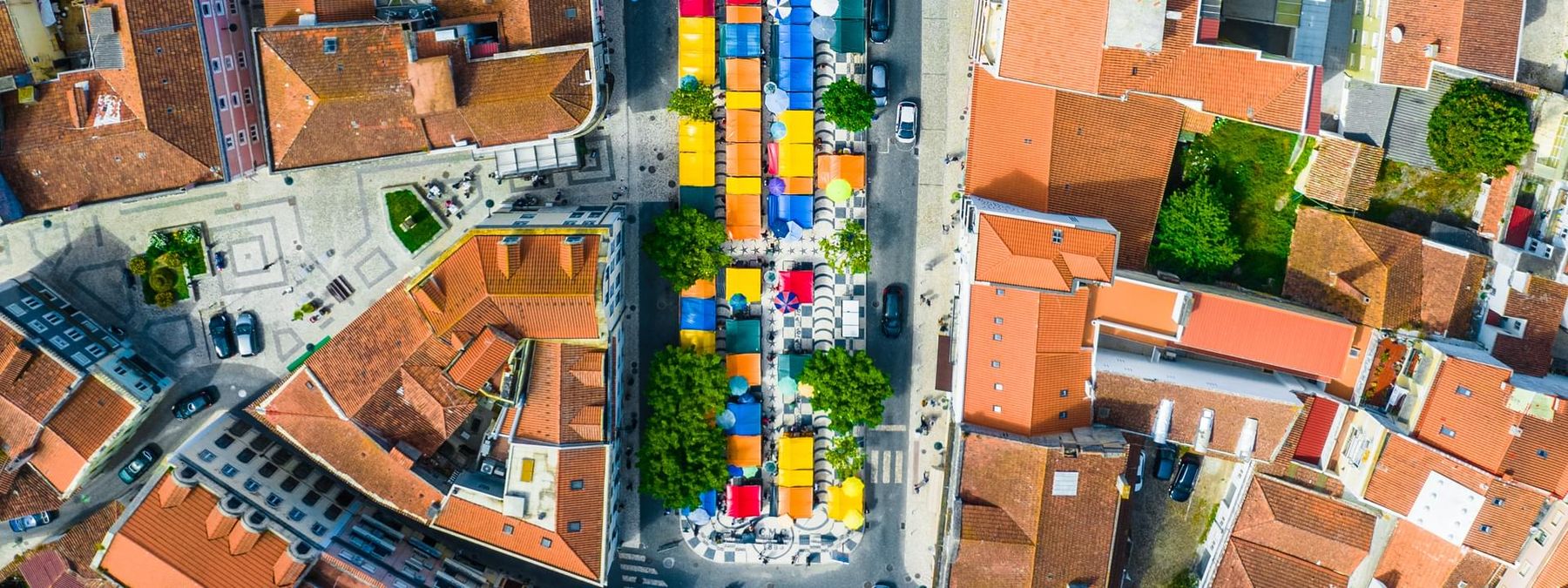 Aerial view of Praça da Fruta's colourful market stalls in Caldas da Rainha